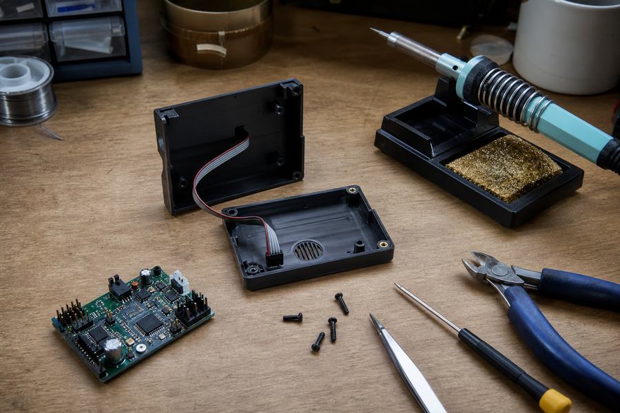 Hardware prototype and enclosure on a workbench